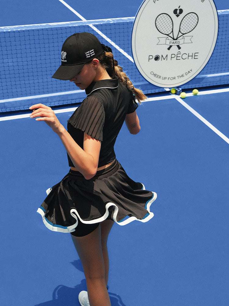 Black tennis baseball cap with embroidered Pom Pêche logo and detachable ribbon.