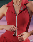 Red dress with a brand logo on a blurred background