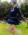 Spin Layered Mesh Pleated Tennis Skirt Navy, double layer pleated mesh tennis skort with built-in shorts, elegant flowy design, and sporty feminine style