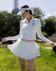 Spin Layered Mesh Pleated Tennis Skirt White in motion, showcasing lightweight double layer pleated mesh, flowy skirt movement, and elegant tennis skort design