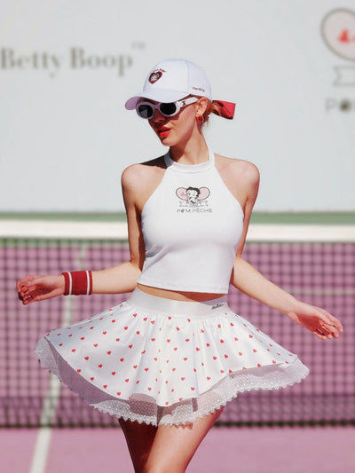 Model posing in Betty Boop Bow Halter Tennis Top - Paris White
