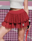 Person wearing a red skirt with a blurred background
