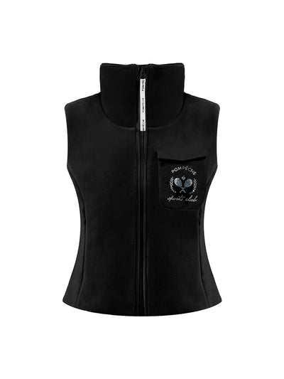 Warm black fleece vest with high-neck zip design and embroidered chest pocket, styled on the tennis court.