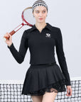 Black long-sleeve zip-collar polo top with a subtle printed logo, featuring a fitted silhouette for a sleek, sporty look.
