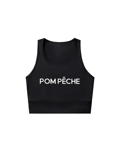 Black sports bra with brand logo, designed for comfort and style during active sports.