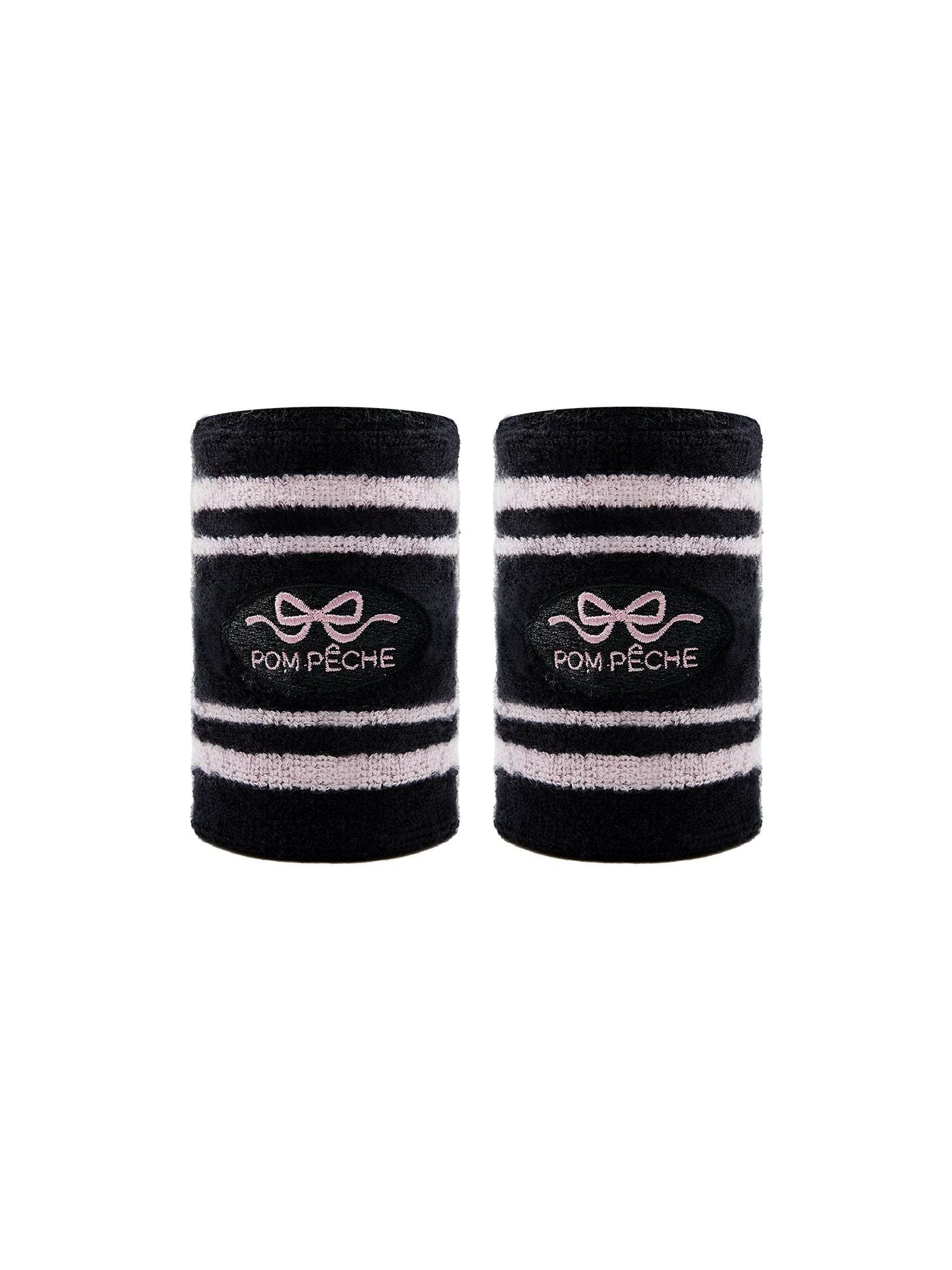 Black tennis wristbands with soft pink stripes, featuring embroidered bow and logo details.