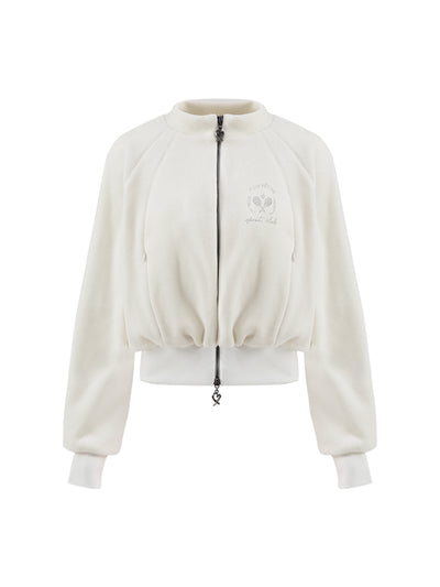 Cream fleece zip-up jacket with a soft texture and subtle logo detail, offering a polished yet cozy look.
