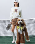 Soft, casual sweatshirt featuring a playful dog-and-tennis graphic, perfect for relaxed, sporty looks.