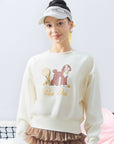 Soft, casual sweatshirt featuring a playful dog-and-tennis graphic, perfect for relaxed, sporty looks.