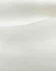 Close-up of cream sweatshirt's fabric material. 