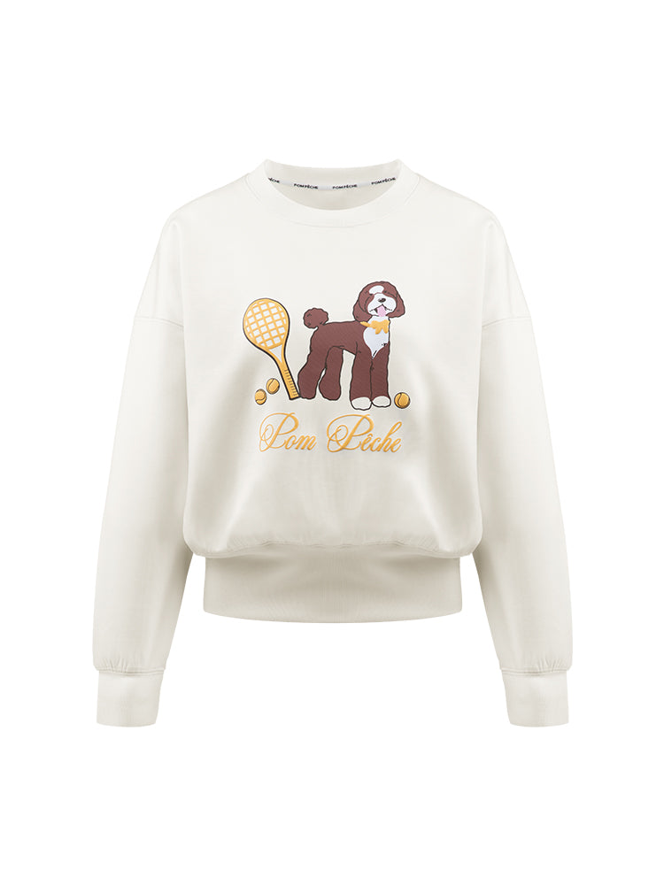 Soft, casual sweatshirt featuring a playful dog-and-tennis graphic, perfect for relaxed, sporty looks.