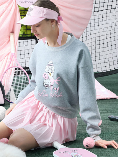 Soft, casual sweatshirt featuring a playful dog-and-tennis graphic, perfect for relaxed, sporty looks.