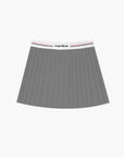 A sporty grey pleated tennis skirt for women, showcasing a classic fit with flowing pleats suitable for tennis, golf, and daily workouts.