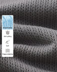 Grey Poise™ knit polo shirt, made from a breathable, pill-resistant, soft, and shape-resistant fabric.