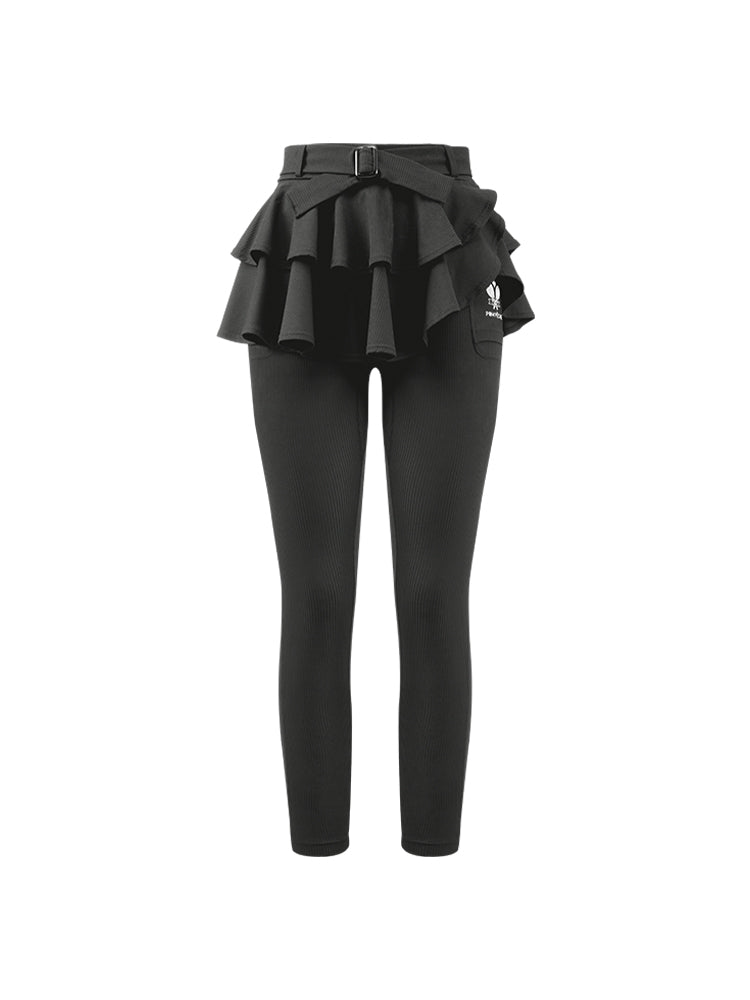 Grey tennis leggings with a tiered ruffle skirt and high waist, stretchy fabric for comfort and active movement .