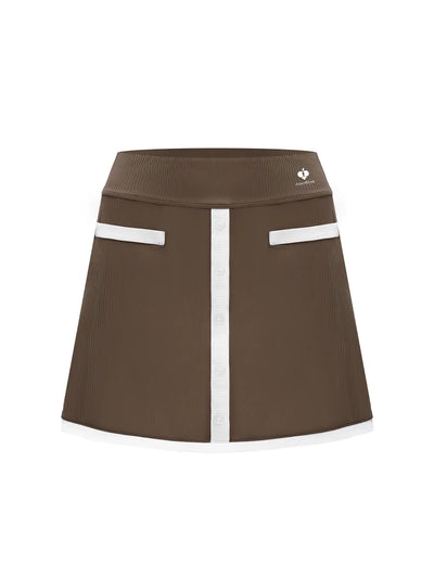 Khaki tennis mini skirt with contrast trims and button-front detail, offering a neat, preppy look for court or casual wear.