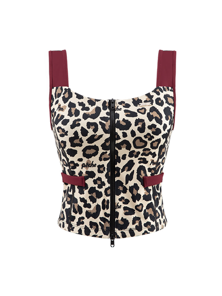 Leopard print sports tank with contrast straps and a zip front. Fitted, chic, and perfect for elevating on-court look.