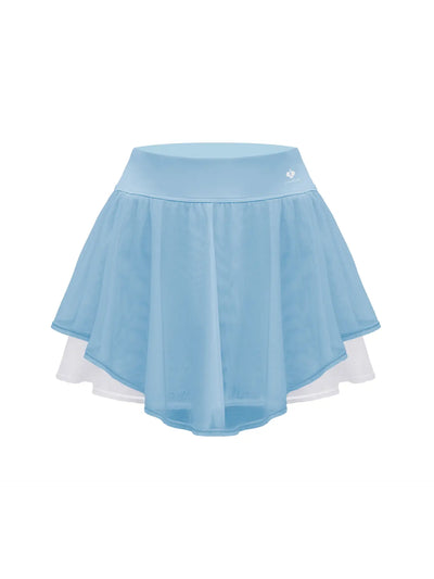 Light blue layered tennis skirt with chiffon layers and built-in shorts, offering a soft, breathable fit.