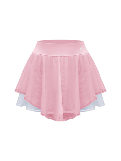 Soft pink layered tennis skirt with chiffon layers and built-in shorts, offering a soft, breathable fit.