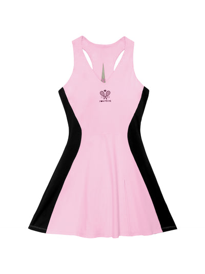 Pink V-neck tennis dress with black curved side panels, styled on the court.