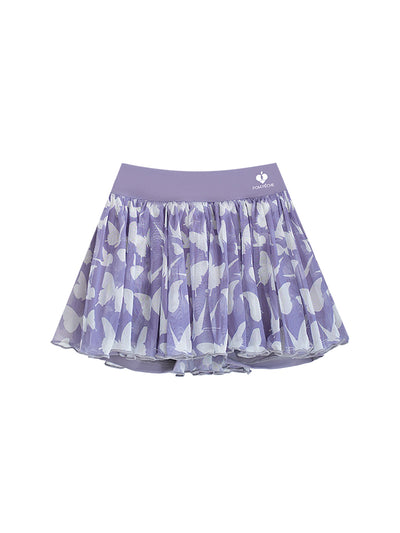A purple butterfly mesh tennis skirt displayed on a white background, featuring a flowy pleated mesh design and built-in shorts suitable for tennis, pickleball, and athletic activities.