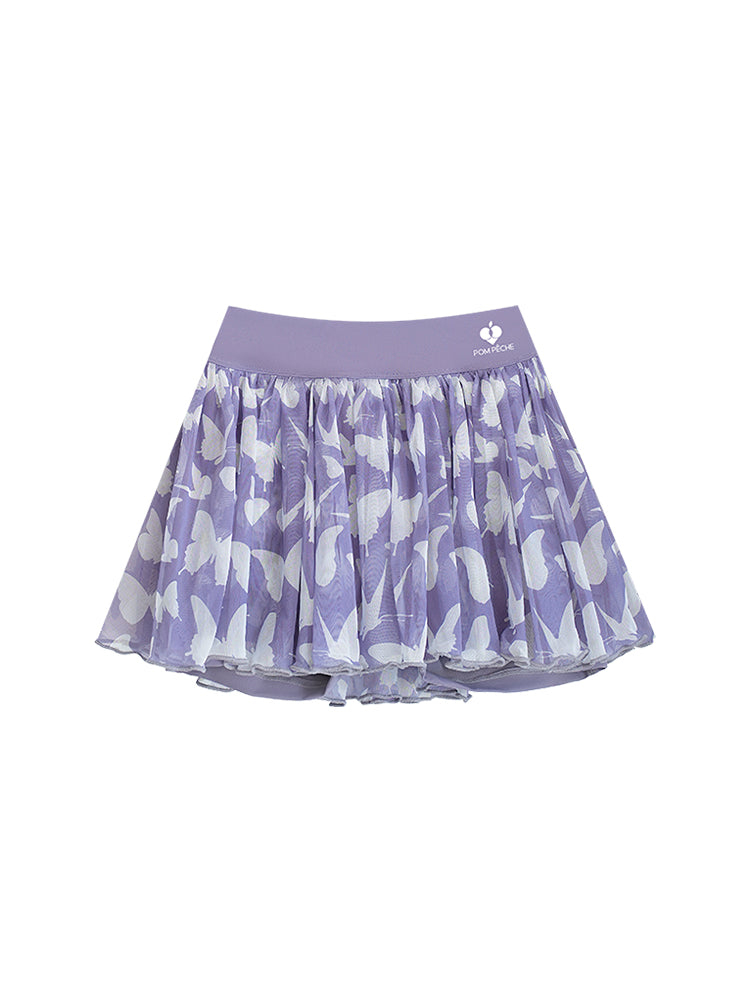 A purple butterfly mesh tennis skirt displayed on a white background, featuring a flowy pleated mesh design and built-in shorts suitable for tennis, pickleball, and athletic activities.