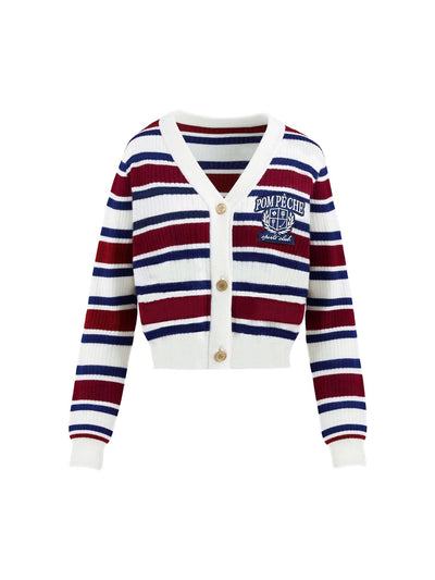 Red, navy, and white striped cardigan with a V-neck, button-down design, featuring an embroidered logo. Styled from court to café.