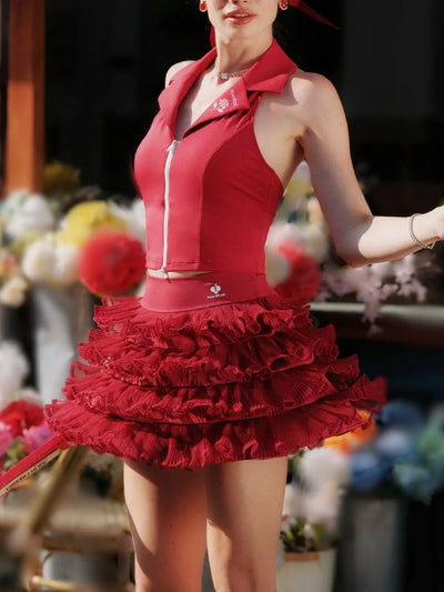 Woman wearing a red dress with a floral background