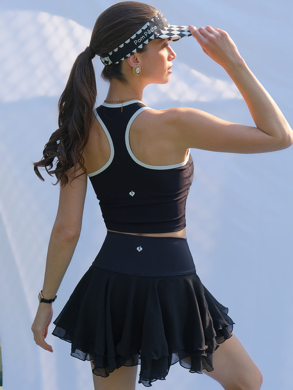 Tina nigra feino tenisa jupo