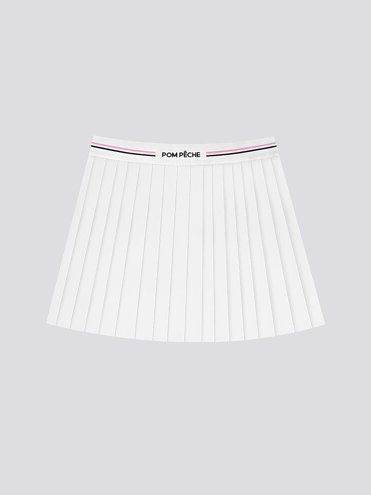 The white pleated tennis skirt is displayed clearly to highlight its classic athletic structure and fit.
