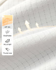 White Poise sun jacket fabric detail showing UPF50+ protection, breathable lightweight material, airy feel, and thumb hole design