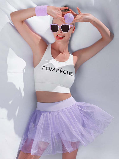 White sports bra with brand logo, designed for comfort and style during active sports.