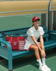 Pom Pêche wine red checkered tennis tote bag with embroidered logo.