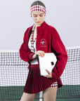 Deep red fleece zip-up jacket with a soft texture and subtle logo detail, offering a polished yet cozy look.