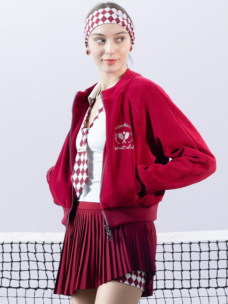 Deep red fleece zip-up jacket with a soft texture and subtle logo detail, offering a polished yet cozy look.