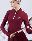 Deep red long-sleeve zip-collar polo top with a subtle printed logo, featuring a fitted silhouette for a sleek, sporty look.