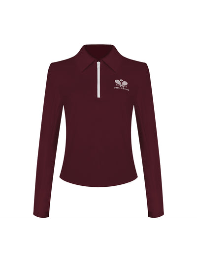 Deep red long-sleeve zip-collar polo top with a subtle printed logo, featuring a fitted silhouette for a sleek, sporty look.