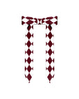 Wine red tennis cap with embroidered logo and adjustable ribbon on the back strap.