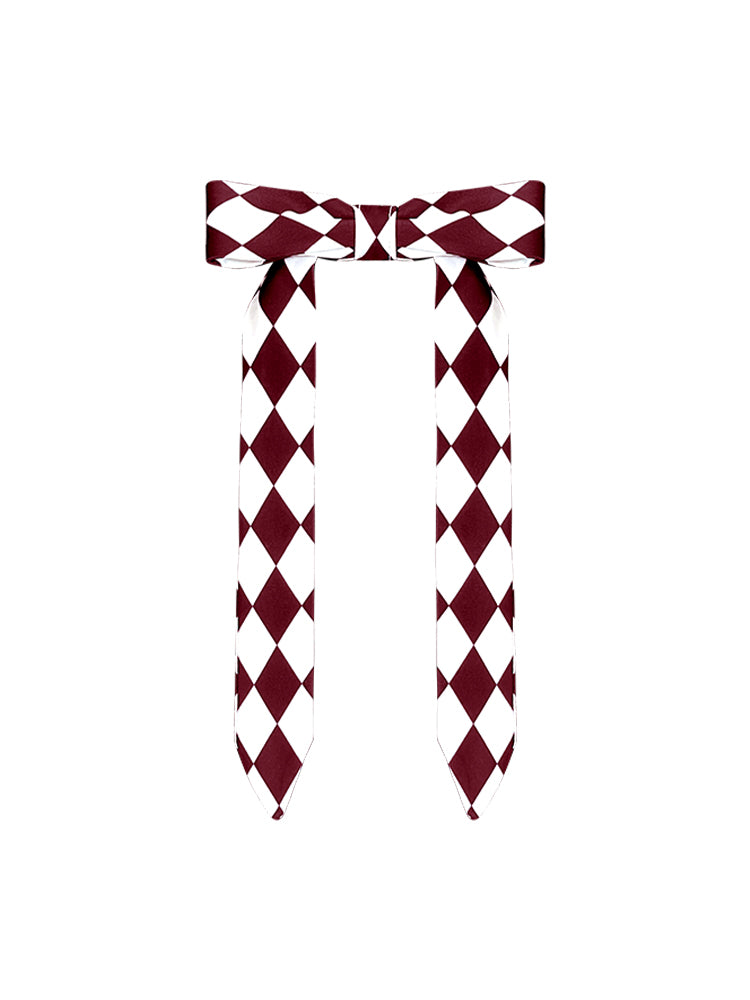 Wine red tennis cap with embroidered logo and adjustable ribbon on the back strap.