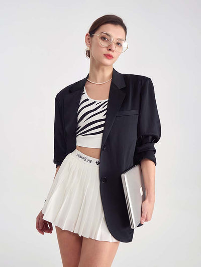 White sports bra with printed zebra pattern, designed for comfort and style during active sports.