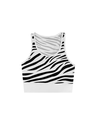 White sports bra with printed zebra pattern, designed for comfort and style during active sports.