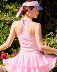 Pink sleeveless tennis top with racerback design to show off the curves of the shoulders and back.