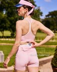 Betty Boop High Waisted Running Shorts Pink back view, featuring sculpting high waist fit, back phone pocket, contouring seam, and flattering women's running shorts design