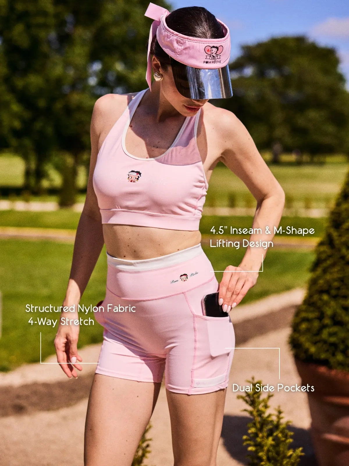 Betty Boop High Waisted Running Shorts Pink pocket detail, featuring secure phone pocket, hidden side pockets, and practical women's running shorts design