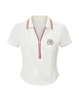 Betty Boop Poise™ V-Neck Polo Top white flat lay – contrast burgundy collar trim, half-zip closure, Betty Boop collegiate crest on chest