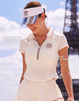 Betty Boop Poise™ Polo Top – elegant half-zip construction and flattering waist-cinching silhouette callout, cool-touch piqué fabric
