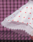 Close-up of Betty Boop Spin™ Heart Dot Lace Skirt with delicate lace trim and satin fabric details