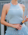 Blue Bow Halter Tennis Top – contrast ribbon bow decoration and built-in bra detail callout, four-way stretch nylon fabric
