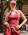 Red Cooling Tennis Visor by Pom Pêche, outdoor sport look paired with red halter top and jogger set
