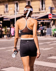 High Slit Contrast Active Shorts Navy back view, showcasing athletic silhouette, confident movement, built-in liner, and sporty women's activewear style